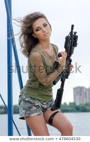Pictures bikini young girls holding rifle