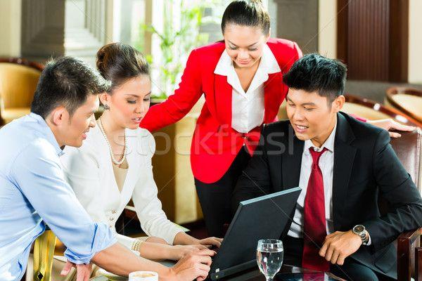 Asian business men meeting